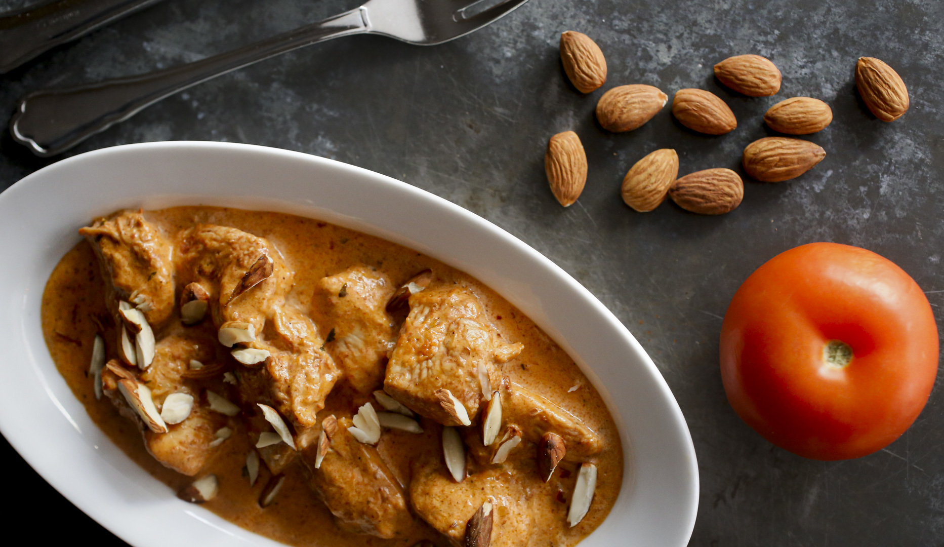 Slow-cooked lamb curry with saffron rice